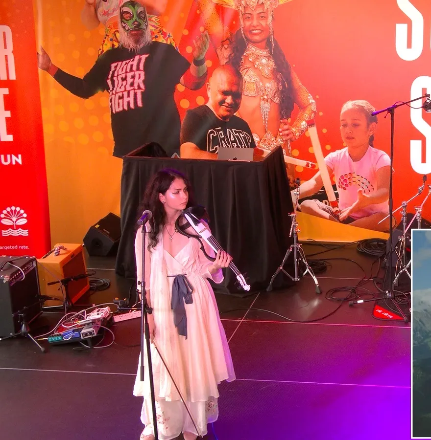 Strings and vocals on stage under the Summer in the Square backdrop